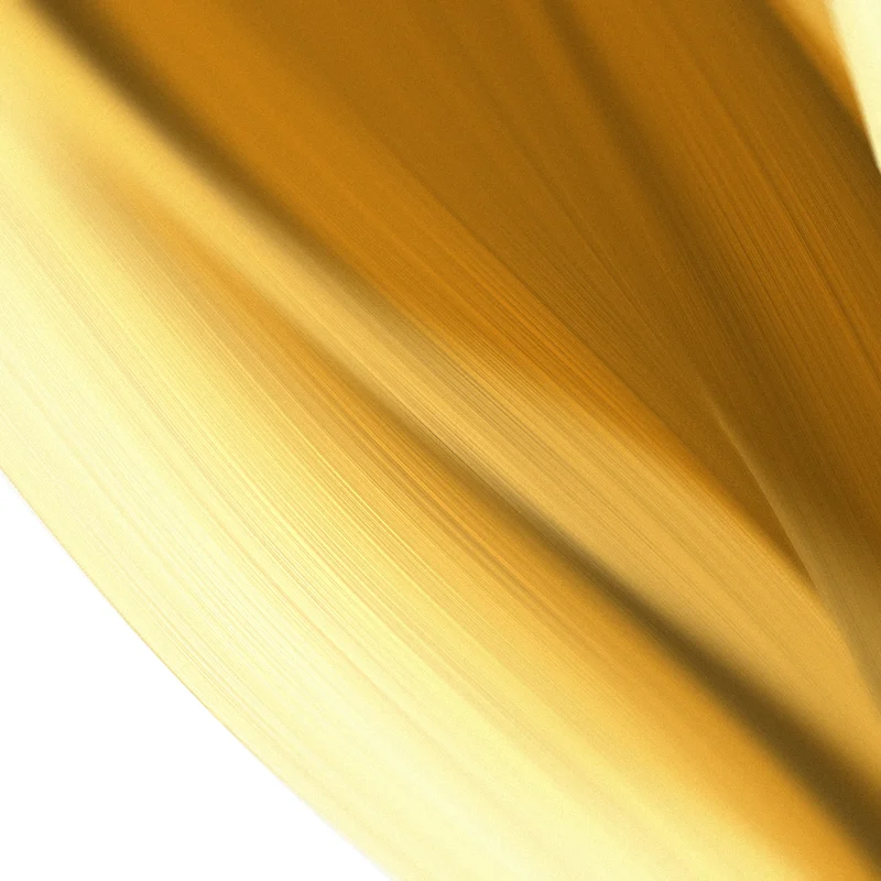 Close-up of a gold ribbon in brushed metal